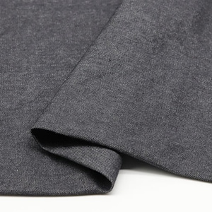 May include: Close-up of a dark grey fabric with a textured surface. The fabric is folded and the number 8# is visible in the top right corner.