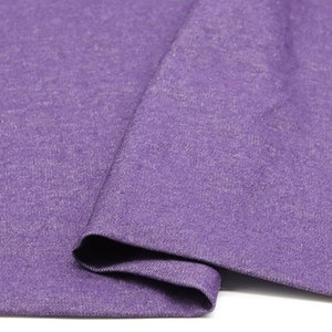 May include: A close-up of a purple fabric with a textured surface. The fabric is folded in half and the number "4#" is visible in the top right corner.