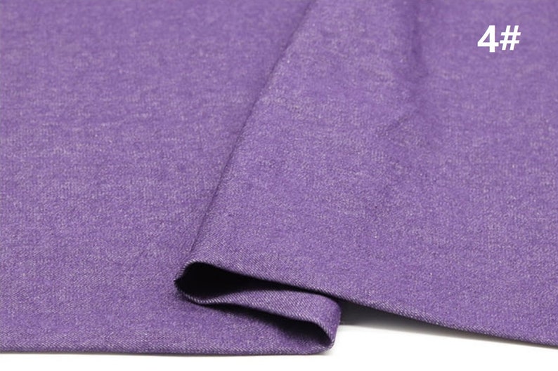 May include: A close-up of a purple fabric with a textured surface. The fabric is folded in half and the number "4#" is visible in the top right corner.
