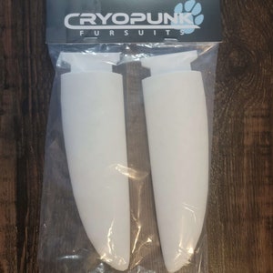 May include: Two white, plastic, curved,  fursuit paw molds in a clear plastic bag with a black and white label that reads "Cryopunk Fursuits".