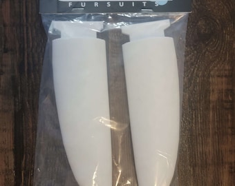 May include: Two white, plastic, curved,  fursuit paw molds in a clear plastic bag with a black and white label that reads "Cryopunk Fursuits".