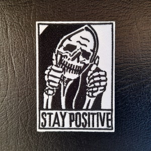 Stay Positive Embroidered Patch - Black & White Iron On Patches - Funny Irony Patches - Skeleton Skull Punk Decals - Dark Humour Patches