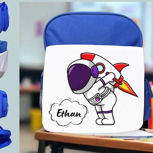 Cartable personnalisé maternelle astronaute et fusée au prénom de l'enfant sac à dos rouge- A l'école, la crèche, nounou - non genré unisexe