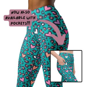 May include: Teal leggings with a leopard print and pink hearts. The leggings have pockets on the sides. "NOW ALSO AVAILABLE WITH POCKETS!!!" is written in pink on the image.