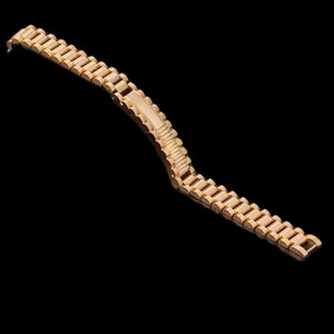 May include: A gold-toned metal watch band with a linked design.