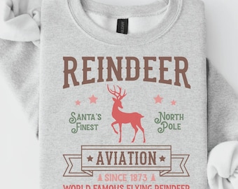 Reindeer Aviation Sweatshirt, North Pole Shirt, Retro Christmas Graphic, Santa Flying Reindeer Design, Winter Outfit, Gift for Her - S69