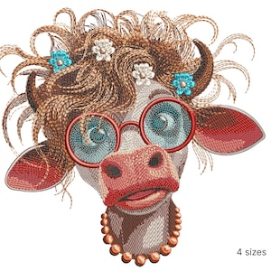 May include: Embroidered design of a cow with brown curly hair, wearing red glasses and a pearl necklace. The cow has a pink nose and a surprised expression.