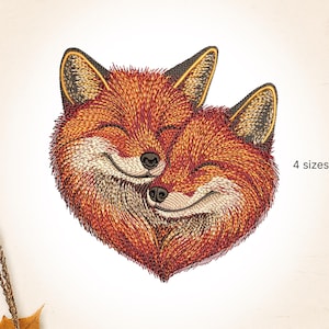 May include: Embroidered design of two smiling foxes, forming a heart shape. The foxes are in shades of orange, brown, and black, with the text "4 sizes" visible. This design is suitable for various embroidery projects.