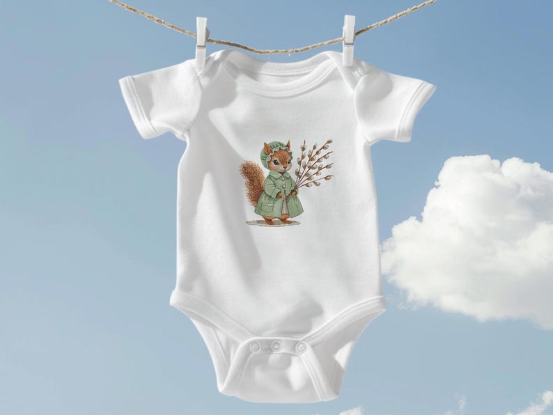 May include: White baby onesie with a cute illustration of a squirrel wearing a green coat and holding a branch of willow.