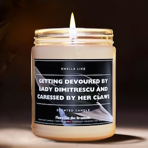 Smells Like Getting Devoured by Lady Dimitrescu and Caressed by Her Claws Scented Soy Candle  | Resident Evil inspired candles merch