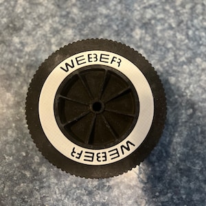 White Walls securely fit on wheels as shown in photo for illustration