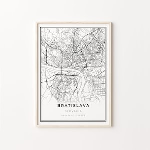 May include: A black and white city map print of Bratislava, Slovakia. The map shows the city's streets, rivers, and landmarks. The print includes the city's name, country, and coordinates: 48°08'38"N | 17°06'35"E.