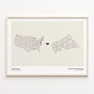 May include: A map print with a heart connecting the United States and the Central African Republic. The coordinates for each country are listed below the map.