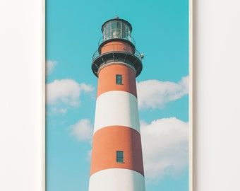 May include: A red and white striped lighthouse with a black roof and a glass lantern on top. The lighthouse is against a blue sky with white clouds.