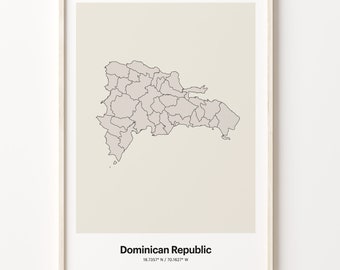May include: A beige map of the Dominican Republic with its provinces outlined in black. The map is framed in a light wood frame. The text "Dominican Republic" and "18.7357° N / 70.1627° W" is printed below the map.
