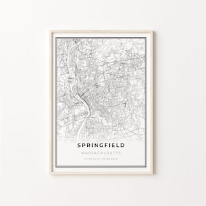 Puede incluir: Una impresión de mapa en blanco y negro de Springfield, Massachusetts. El mapa muestra las calles y los puntos de referencia de la ciudad. El texto "SPRINGFIELD MASSACHUSETTS 42°06'05"N | 72°35'25"W" está impreso debajo del mapa.