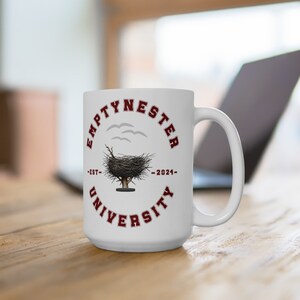 Tomt bo-kaffemugg, fågelbo-design, tomt bo-present, minnesmugg, tomt bo-firande, perfekt present för tomt bo-besökare.