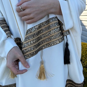 Elegant white abaya with gold & black details