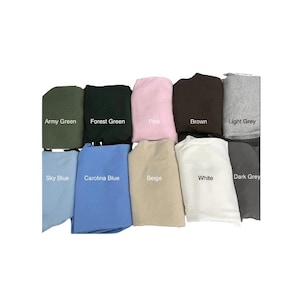 May include: A selection of ten fabric swatches in various colors, including army green, forest green, pink, brown, light grey, sky blue, carolina blue, beige, white, and dark grey.