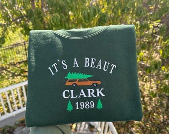 It’s a Beaut Clark embroidered crewneck; Griswold embroidered sweatshirt;  Funny Christmas vacation hoodie. holiday gift for him/her