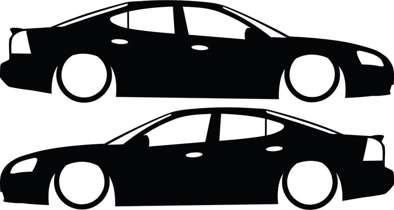 May include: Two black sedan car silhouettes with white wheels are depicted against a white background. The cars are side-view illustrations, showcasing the vehicle's shape and design. The image is a simple, graphic representation of a car.