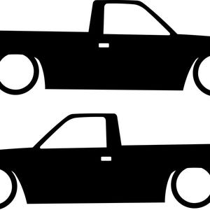 May include: Black silhouette of two lowered pickup trucks. The trucks have a classic design with a single cab and a flatbed. The wheels are large and the trucks are close to the ground.