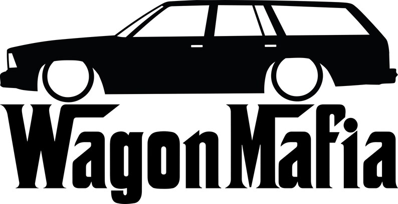 May include: Black silhouette of a station wagon with large wheels, above the words "Wagon Mafia" in bold, stylized font. The image is a graphic design, likely for apparel or car-related merchandise.
