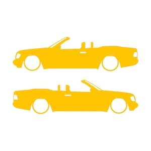 Set van 2 autosilhouet-stickers voor de Mercedes E-Klasse W124 Cabriolet. Geel