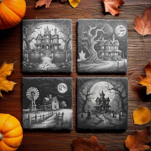 May include: Set of four black slate coasters with spooky Halloween scenes. Each coaster features a different haunted house, a full moon, and a spooky tree. The coasters are perfect for adding a touch of Halloween spirit to your home.