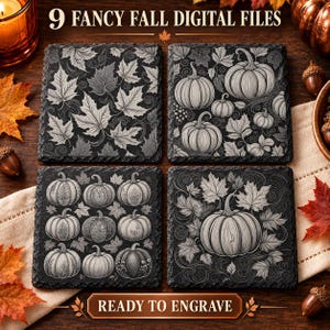 May include: Four square black slate coasters featuring white engraved autumn designs. One shows maple leaves, another displays pumpkins and vines, the third features nine patterned pumpkins, and the fourth shows a large pumpkin with leaves.