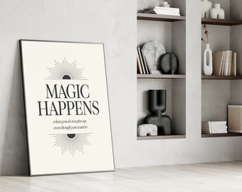May include: A black and white motivational poster with the text "MAGIC HAPPENS when you do not give up, even though you want to". The text is surrounded by two stylized sunbursts.