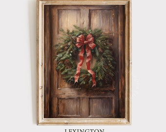 May include: A framed print depicting a Christmas wreath on a wooden door. The wreath features evergreen foliage, pine cones, and a red bow. The door is a warm brown, and the frame is gold. The text "LEXINGTON PRINTS" is displayed at the bottom of the print.