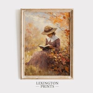Vintage fall woman reading book fall painting oil painting art print displayed in an antique frame against a white background. The painting features intricate brushwork and colors. The shop name Lexington Prints is written out beneath the wall art.