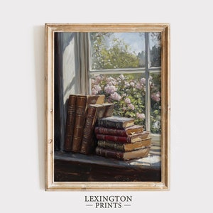 Puede incluir: Una pintura de una ventana con vista a un jardín con flores rosas. Una pila de libros antiguos se encuentra en un alféizar de la ventana a la luz del sol.