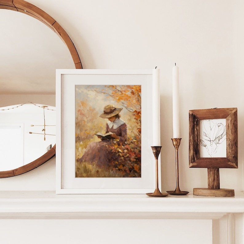 Vintage fall woman reading book fall painting oil painting art print displayed in an antique frame against a white background. The painting features intricate brushwork and colors. The shop name Lexington Prints is written out beneath the wall art.