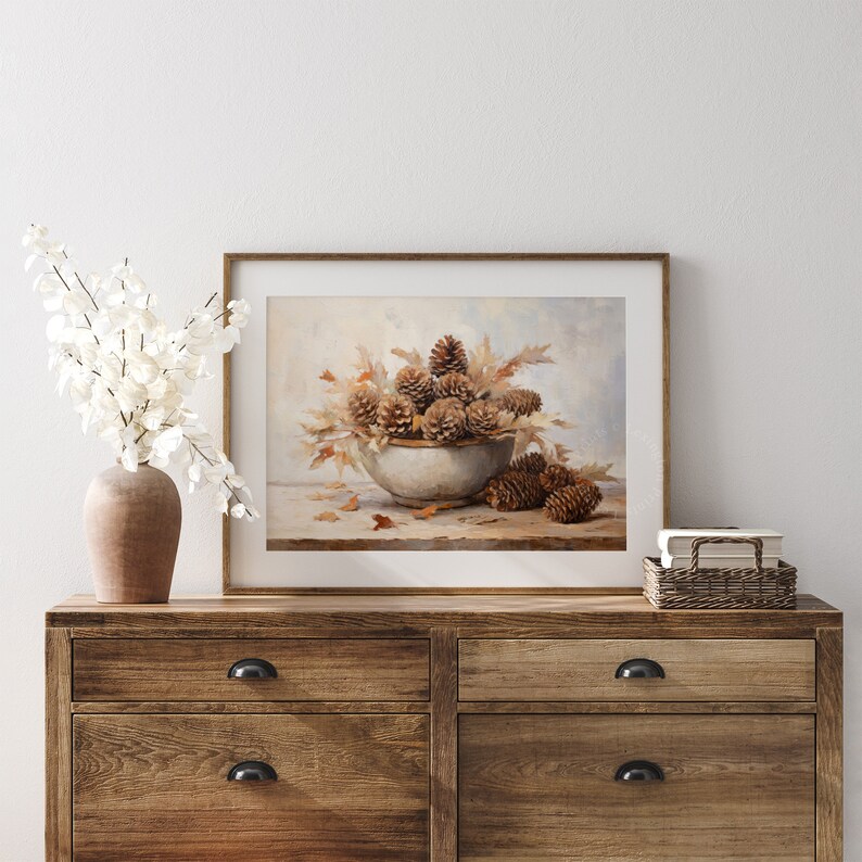 Fall Vintage fall pinecone decor painting oil painting art print displayed in an antique frame against a white background. The painting features intricate brushwork and colors. The shop name Lexington Prints is written out beneath the wall art frame