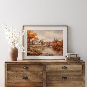 Vintage city town painting oil painting art print displayed in an antique frame against a white background. The painting features intricate brushwork and colors. The shop name Lexington Prints is written out beneath the wall art frame.