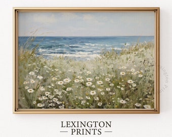 Peut inclure: Une peinture représentant un paysage maritime avec des marguerites blanches au premier plan et une mer bleue en arrière-plan. La peinture est encadrée d'un cadre doré et porte le texte "LEXINGTON PRINTS" en bas.