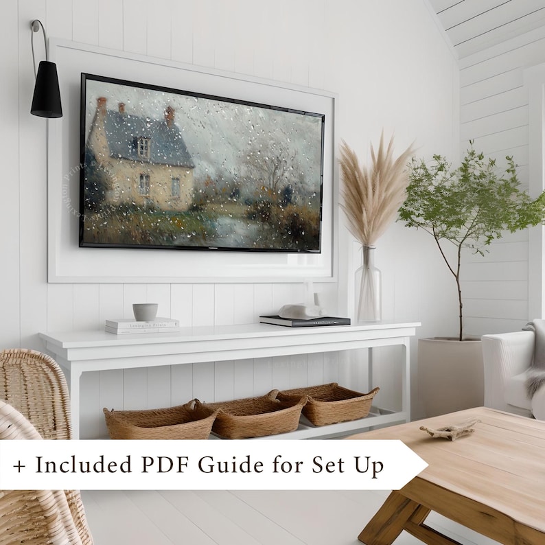 Vintage Spring Frame TV art for the Samsung Frame TV of a dark moody raining spring landscape as seen from the glass of a window. There are water droplets on the window. The artwork features neutral gray and brown tones. This Spring wall art decor is meant to be displayed in a Frame TV and it can also be used as farmhouse decor or cottagecore decor. The shop name Lexington Prints is listed below.