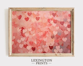 May include: A framed print of a pink and red abstract painting featuring a pattern of overlapping hearts.