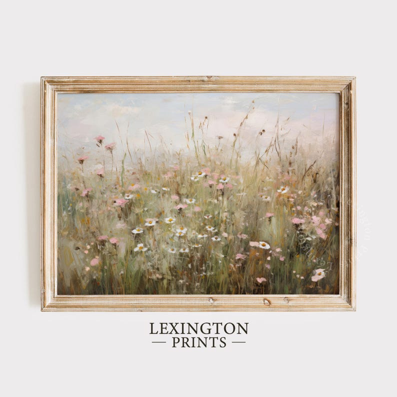 Vintage Spring wall art wildflower field landscape painting art print displayed in an antique frame, featuring pink and beige wildflowers up close. This Spring decor can also be Easter decor. The painting features intricate brushwork and colors. The shop name Lexington Prints is written below.