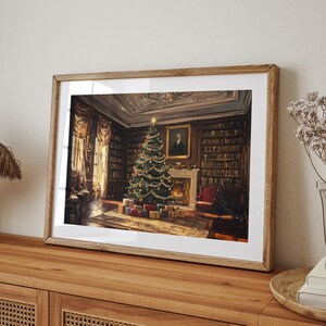 Vintage Christmas wall art print of a Christmas tree and presents in a moody Victorian library living room. It is displayed in an antique frame. The painting features intricate brushwork and colors. The shop name Lexington Prints is written out