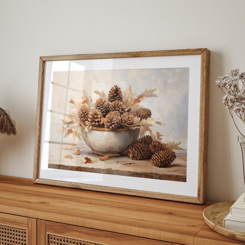Fall Vintage fall pinecone decor painting oil painting art print displayed in an antique frame against a white background. The painting features intricate brushwork and colors. The shop name Lexington Prints is written out beneath the wall art frame