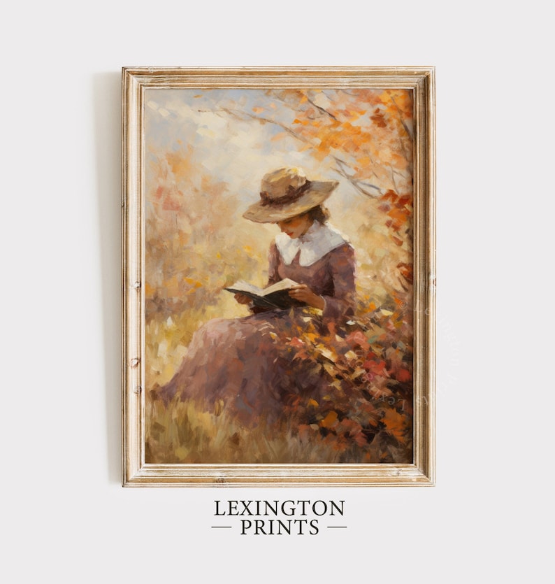 Vintage fall woman reading book fall painting oil painting art print displayed in an antique frame against a white background. The painting features intricate brushwork and colors. The shop name Lexington Prints is written out beneath the wall art.