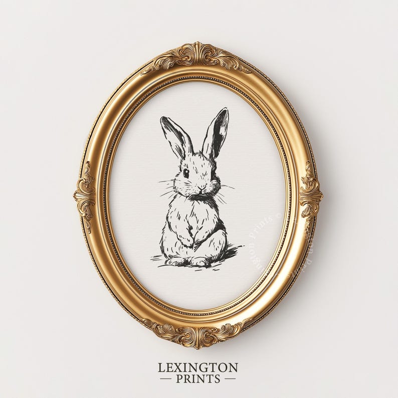 Vintage black sketch wall art of a cute easter bunny rabbit. The sketch art print features thick black sketch work against a simple off white background. The sketch is a minimalist drawing fits an aesthetic for spring decor, easter decor, nursery decor, and rustic farmhouse decor. The shop name LexingtonPrints is written below
