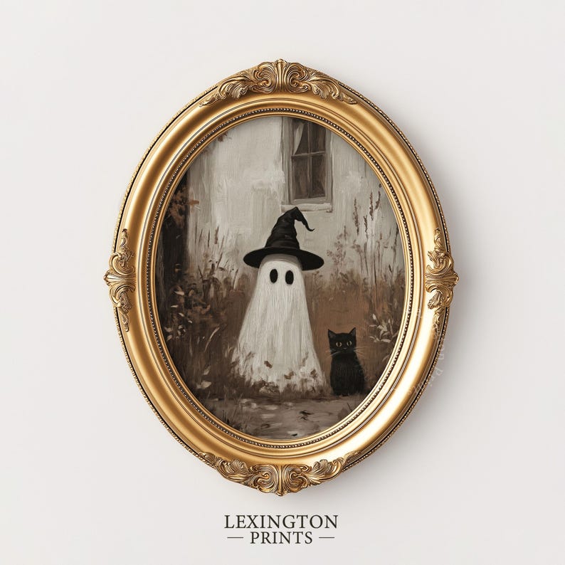 Vintage Halloween wall art print of a cute white ghost dressed as a witch in a witch hat next to his cute black cat in a fall scene. The Halloween painting features moody fall colors of black, white and brown hues along with intricate brushwork. The artwork embodies themes of vintage Halloween wall decor, dark farmhouse decor, dark cottagecore decor, gothic decor, and halloween wall decor. The shop name Lexington Prints is written below