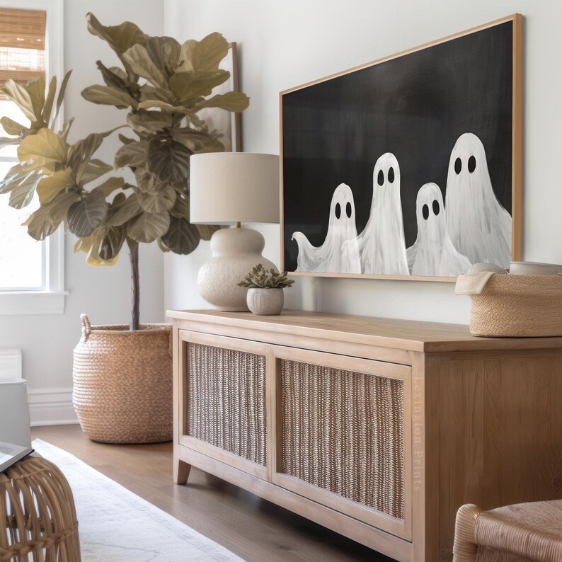 Vintage Halloween Frame TV art for Samsung Frame TV set of 4. This is a bundle of spooky Halloween TV art of jack o lanterns, ghosts, and pumpkins. It is meant to be displayed in a Frame TV. The shop name Lexington Prints is listed below