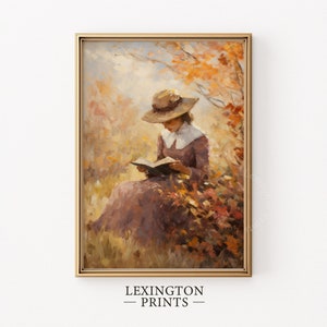 Vintage fall woman reading book fall painting oil painting art print displayed in an antique frame against a white background. The painting features intricate brushwork and colors. The shop name Lexington Prints is written out beneath the wall art.