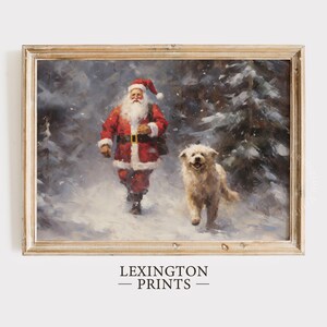 May include: A painting of Santa Claus in a red suit walking through a snowy forest with a white dog. The dog is looking at the viewer. The painting is framed in a light wood frame.