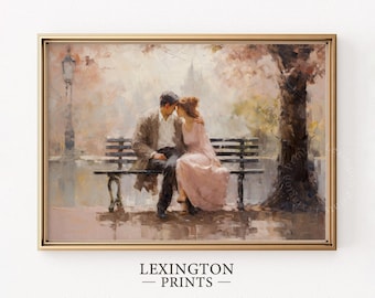 May include: A framed print of a romantic scene. A couple sits close together on a park bench under a tree. The artwork is in soft, muted tones of pink, brown, and beige, with a gold frame. The text "LEXINGTON - PRINTS -" is at the bottom.